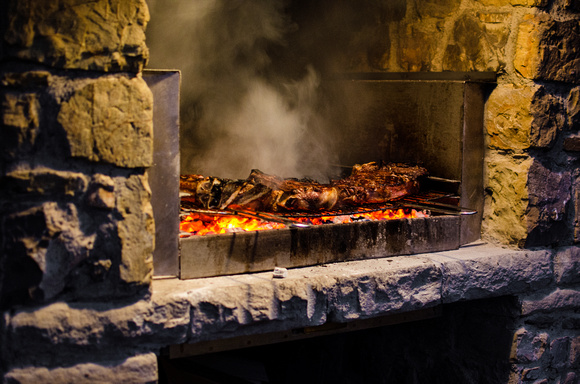 beef stakes in the fire