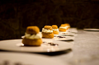 row of plates with desserts