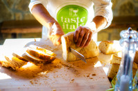 chef slicing bread backlit